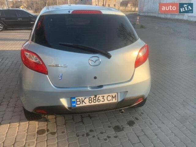 Синий Мазда 2, объемом двигателя 1.3 л и пробегом 198 тыс. км за 5300 $, фото 2 на Automoto.ua