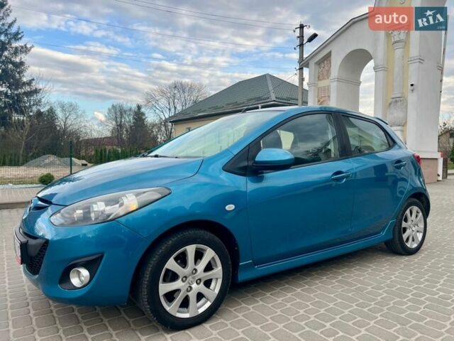 Синій Мазда 2, об'ємом двигуна 1.35 л та пробігом 271 тис. км за 5450 $, фото 12 на Automoto.ua