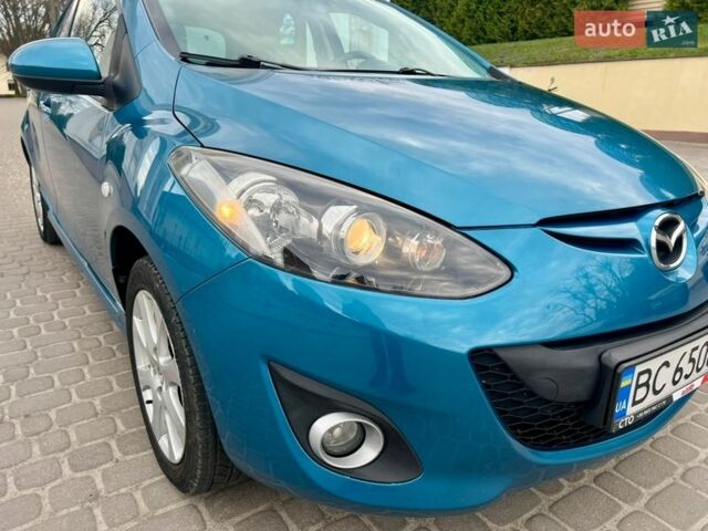 Синій Мазда 2, об'ємом двигуна 1.35 л та пробігом 271 тис. км за 5450 $, фото 10 на Automoto.ua