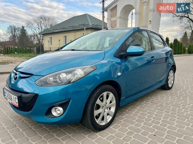 Синій Мазда 2, об'ємом двигуна 1.35 л та пробігом 271 тис. км за 5450 $, фото 14 на Automoto.ua