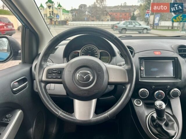 Синій Мазда 2, об'ємом двигуна 1.35 л та пробігом 271 тис. км за 5450 $, фото 19 на Automoto.ua
