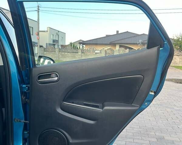 Синій Мазда 2, об'ємом двигуна 1.35 л та пробігом 192 тис. км за 5500 $, фото 15 на Automoto.ua