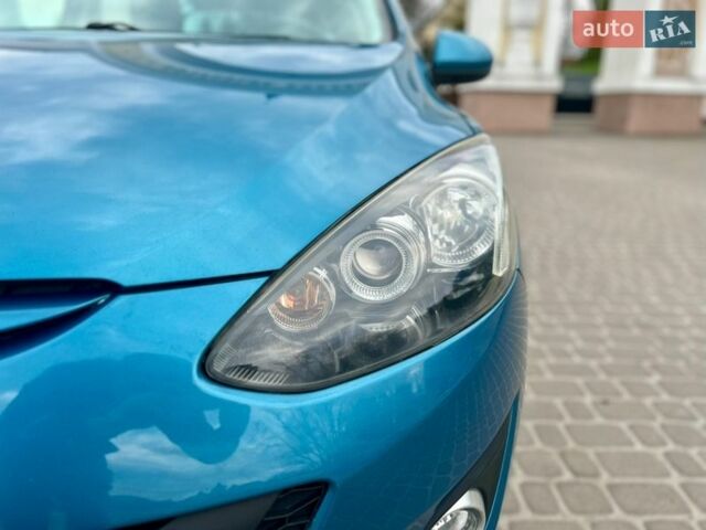 Синій Мазда 2, об'ємом двигуна 1.35 л та пробігом 271 тис. км за 5450 $, фото 26 на Automoto.ua