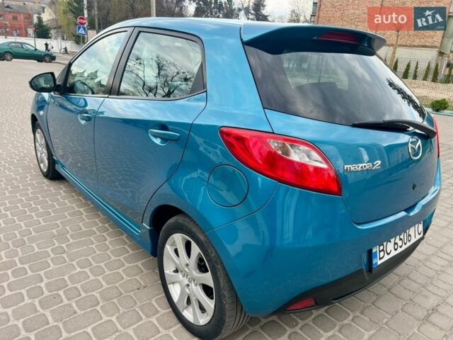 Синій Мазда 2, об'ємом двигуна 1.35 л та пробігом 271 тис. км за 5450 $, фото 5 на Automoto.ua
