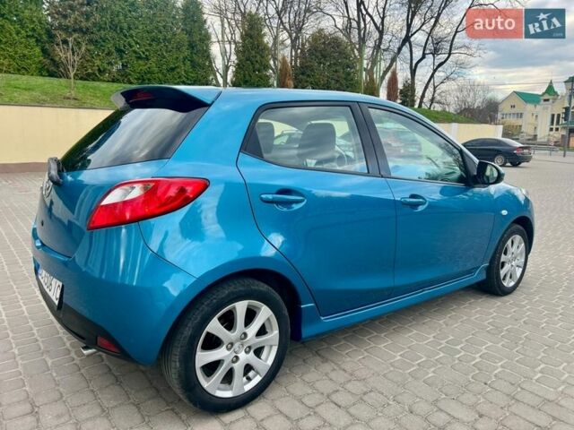 Синій Мазда 2, об'ємом двигуна 1.35 л та пробігом 271 тис. км за 5450 $, фото 6 на Automoto.ua