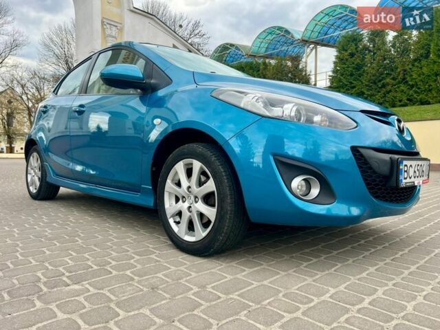 Синій Мазда 2, об'ємом двигуна 1.35 л та пробігом 271 тис. км за 5450 $, фото 4 на Automoto.ua
