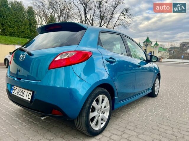 Синій Мазда 2, об'ємом двигуна 1.35 л та пробігом 271 тис. км за 5450 $, фото 7 на Automoto.ua
