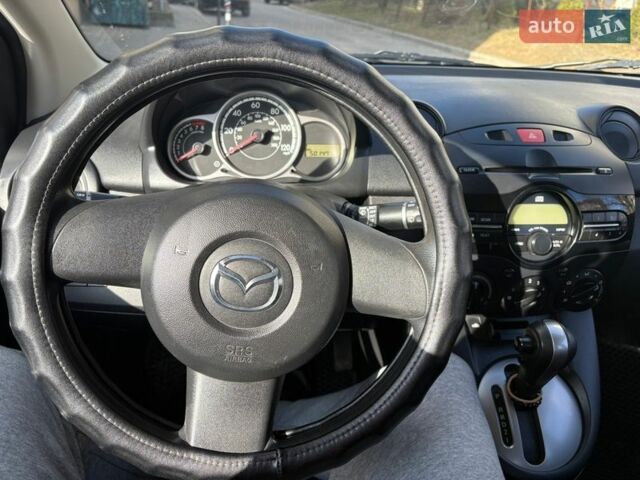 Синий Мазда 2, объемом двигателя 1.5 л и пробегом 80 тыс. км за 7500 $, фото 31 на Automoto.ua