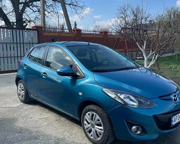 Синий Мазда 2, объемом двигателя 1.35 л и пробегом 165 тыс. км за 8700 $, фото 3 на Automoto.ua