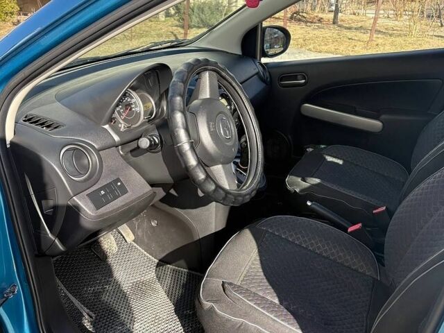 Синій Мазда 2, об'ємом двигуна 1.5 л та пробігом 80 тис. км за 6500 $, фото 9 на Automoto.ua