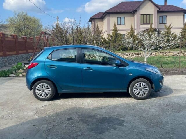 Синій Мазда 2, об'ємом двигуна 1.5 л та пробігом 165 тис. км за 8700 $, фото 4 на Automoto.ua