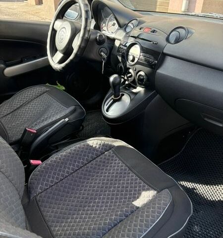 Синий Мазда 2, объемом двигателя 1.5 л и пробегом 80 тыс. км за 7500 $, фото 25 на Automoto.ua