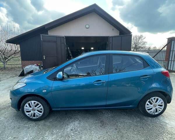 Синий Мазда 2, объемом двигателя 1.35 л и пробегом 165 тыс. км за 8700 $, фото 7 на Automoto.ua