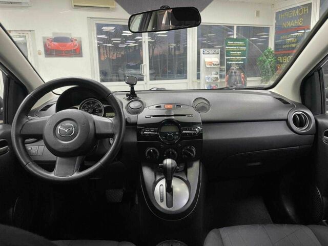 Синий Мазда 2, объемом двигателя 1.5 л и пробегом 166 тыс. км за 6790 $, фото 13 на Automoto.ua