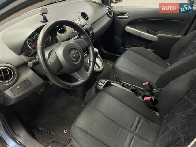 Синий Мазда 2, объемом двигателя 1.5 л и пробегом 166 тыс. км за 8690 $, фото 14 на Automoto.ua
