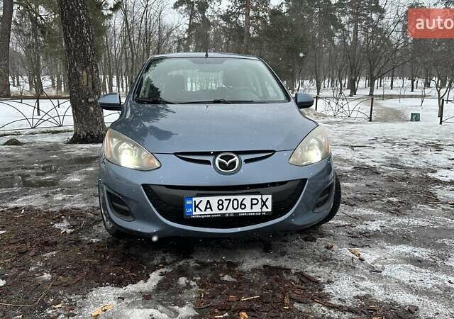 Синий Мазда 2, объемом двигателя 1.5 л и пробегом 166 тыс. км за 8200 $, фото 1 на Automoto.ua