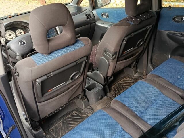 Синий Мазда 2, объемом двигателя 1.8 л и пробегом 318 тыс. км за 3000 $, фото 5 на Automoto.ua