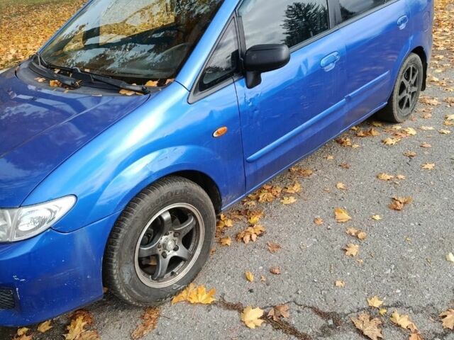Синий Мазда 2, объемом двигателя 1.8 л и пробегом 318 тыс. км за 3000 $, фото 1 на Automoto.ua