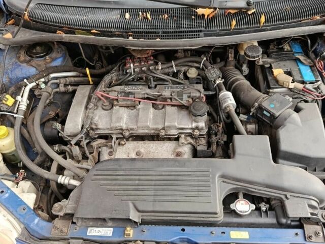 Синий Мазда 2, объемом двигателя 1.8 л и пробегом 318 тыс. км за 3000 $, фото 2 на Automoto.ua