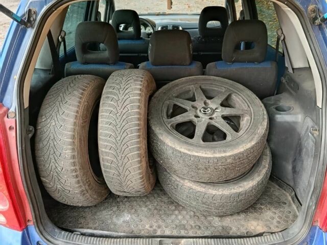 Синий Мазда 2, объемом двигателя 1.8 л и пробегом 318 тыс. км за 3000 $, фото 3 на Automoto.ua