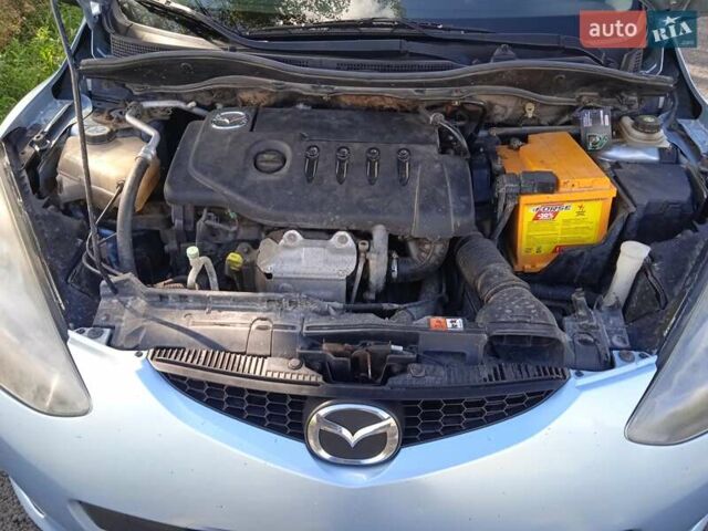 Синий Мазда 2, объемом двигателя 0 л и пробегом 200 тыс. км за 5100 $, фото 5 на Automoto.ua