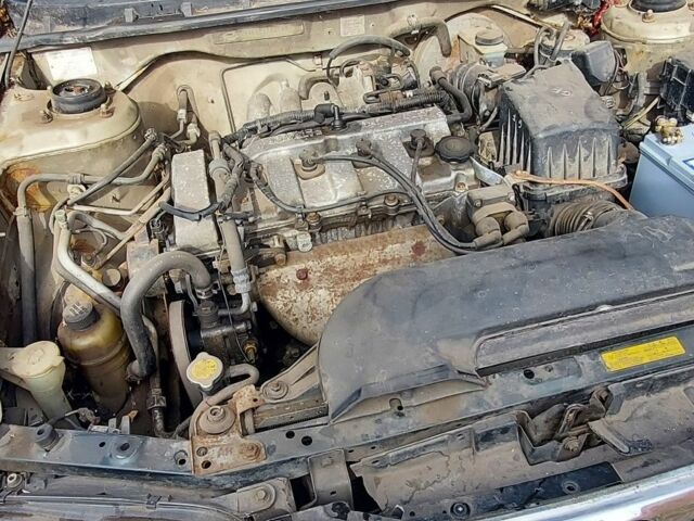 Зеленый Мазда 2, объемом двигателя 0 л и пробегом 312 тыс. км за 1439 $, фото 3 на Automoto.ua