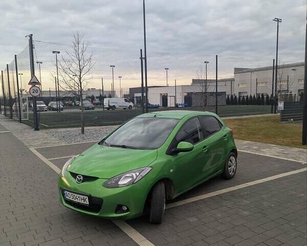 Зеленый Мазда 2, объемом двигателя 1.4 л и пробегом 225 тыс. км за 5000 $, фото 2 на Automoto.ua