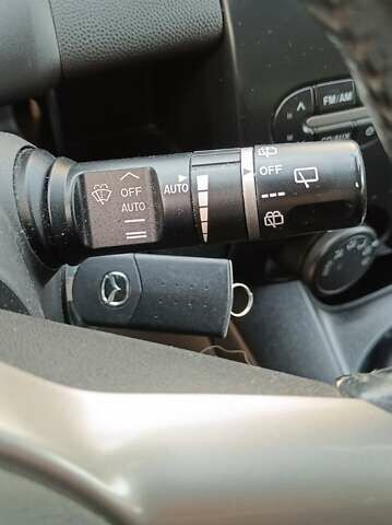 Зеленый Мазда 2, объемом двигателя 1.4 л и пробегом 157 тыс. км за 4590 $, фото 18 на Automoto.ua