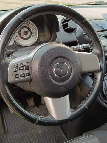 Зеленый Мазда 2, объемом двигателя 1.4 л и пробегом 157 тыс. км за 4590 $, фото 14 на Automoto.ua