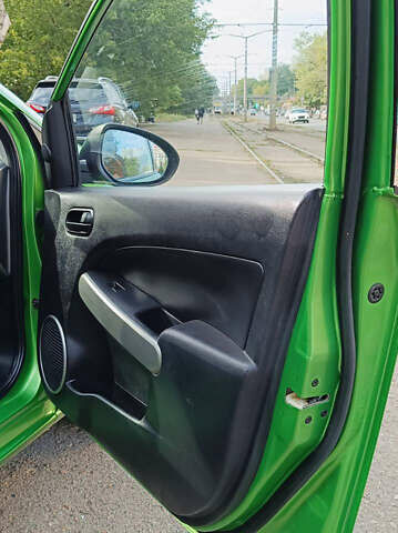 Зеленый Мазда 2, объемом двигателя 1.4 л и пробегом 157 тыс. км за 4590 $, фото 27 на Automoto.ua