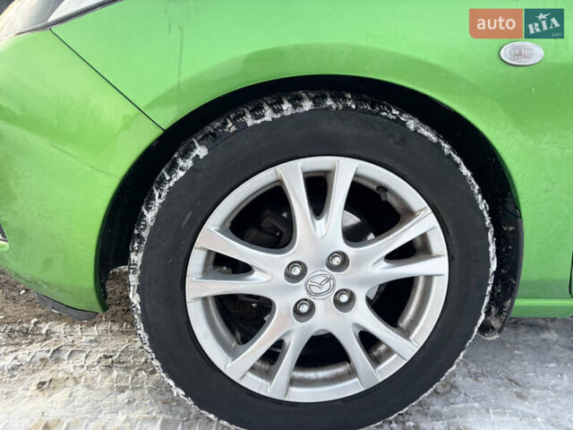 Зелений Мазда 2, об'ємом двигуна 1.5 л та пробігом 107 тис. км за 5850 $, фото 5 на Automoto.ua