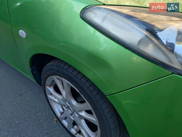 Зеленый Мазда 2, объемом двигателя 1.5 л и пробегом 168 тыс. км за 5700 $, фото 7 на Automoto.ua