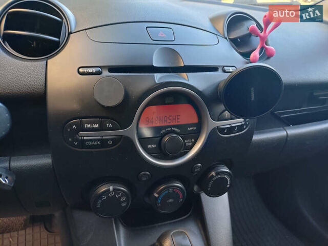 Зеленый Мазда 2, объемом двигателя 1.5 л и пробегом 168 тыс. км за 5700 $, фото 4 на Automoto.ua