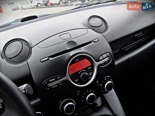 Зелений Мазда 2, об'ємом двигуна 1.4 л та пробігом 169 тис. км за 3700 $, фото 8 на Automoto.ua
