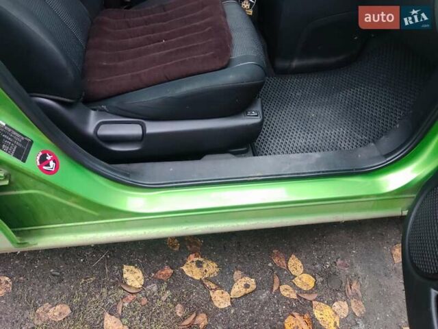 Зеленый Мазда 2, объемом двигателя 1.5 л и пробегом 147 тыс. км за 6000 $, фото 3 на Automoto.ua