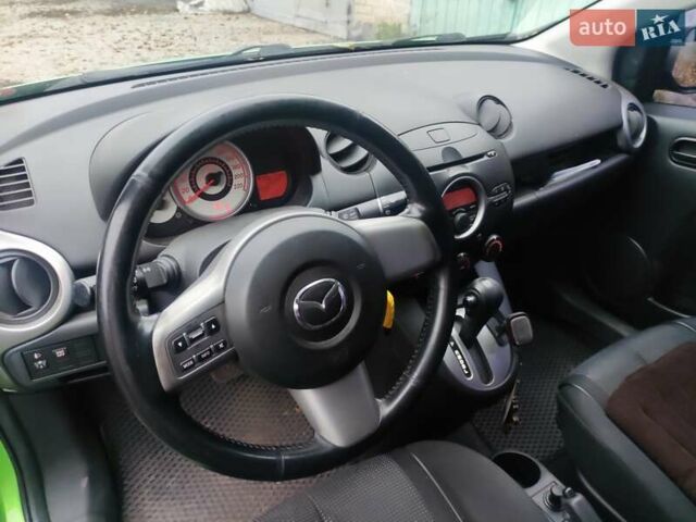 Зеленый Мазда 2, объемом двигателя 1.5 л и пробегом 147 тыс. км за 6000 $, фото 10 на Automoto.ua