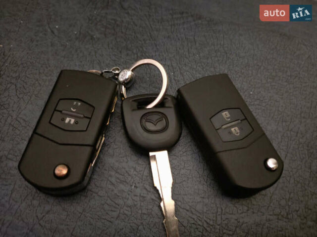 Зеленый Мазда 2, объемом двигателя 1.5 л и пробегом 168 тыс. км за 5700 $, фото 6 на Automoto.ua