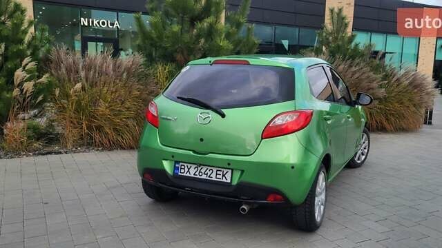 Зелений Мазда 2, об'ємом двигуна 1.5 л та пробігом 69 тис. км за 6300 $, фото 4 на Automoto.ua