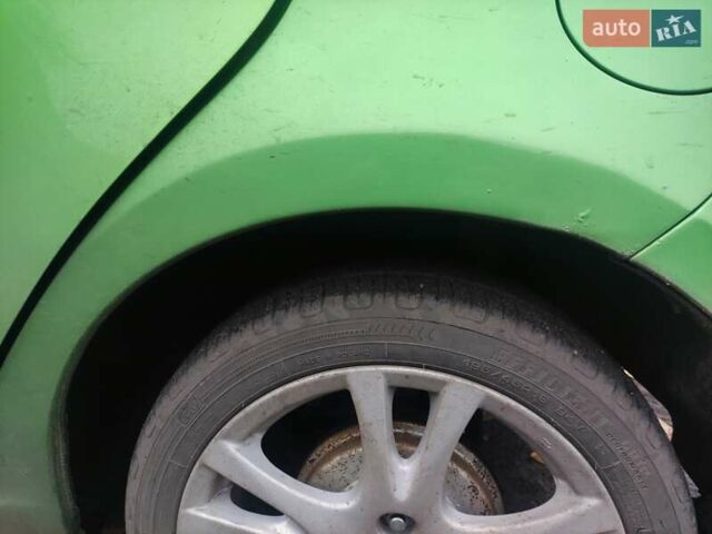Зеленый Мазда 2, объемом двигателя 1.5 л и пробегом 147 тыс. км за 6000 $, фото 8 на Automoto.ua