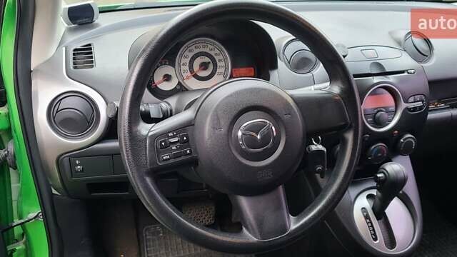 Зелений Мазда 2, об'ємом двигуна 1.5 л та пробігом 69 тис. км за 6300 $, фото 3 на Automoto.ua