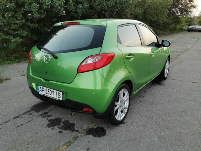 Зелений Мазда 2, об'ємом двигуна 1.5 л та пробігом 102 тис. км за 6800 $, фото 6 на Automoto.ua