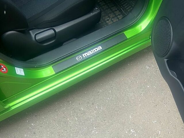 Зеленый Мазда 2, объемом двигателя 1.6 л и пробегом 169 тыс. км за 1900 $, фото 4 на Automoto.ua