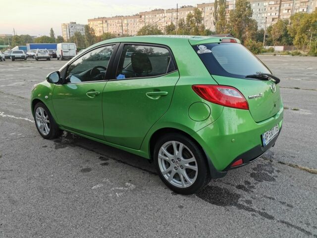 Зелений Мазда 2, об'ємом двигуна 1.5 л та пробігом 102 тис. км за 6800 $, фото 4 на Automoto.ua