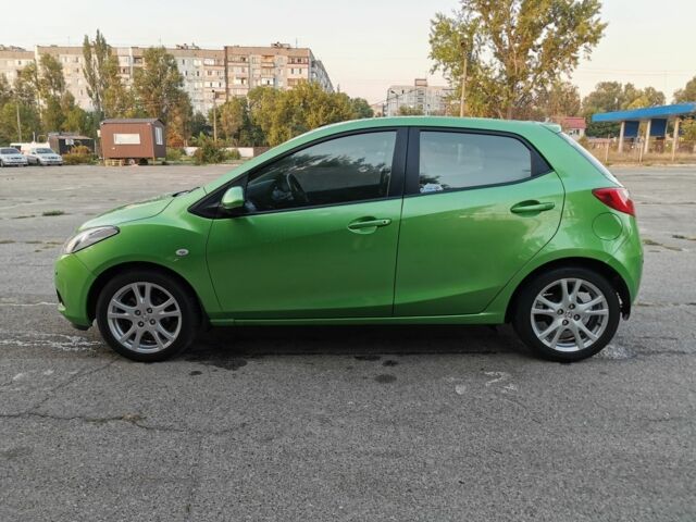 Зелений Мазда 2, об'ємом двигуна 1.5 л та пробігом 102 тис. км за 6800 $, фото 3 на Automoto.ua