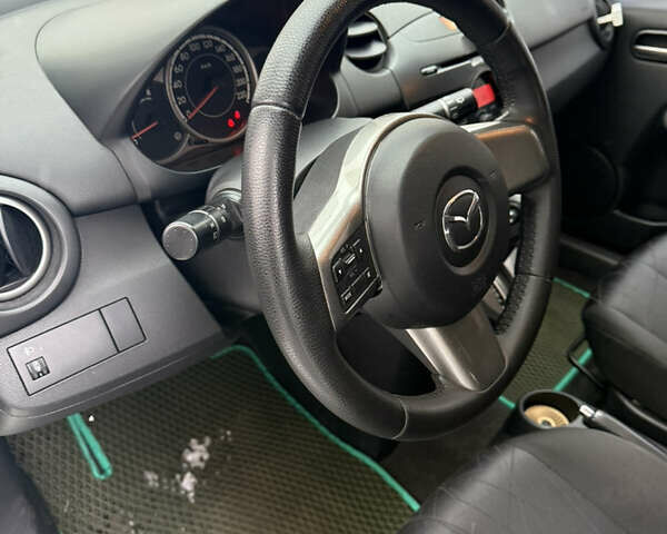 Зелений Мазда 2, об'ємом двигуна 1.5 л та пробігом 151 тис. км за 7100 $, фото 16 на Automoto.ua