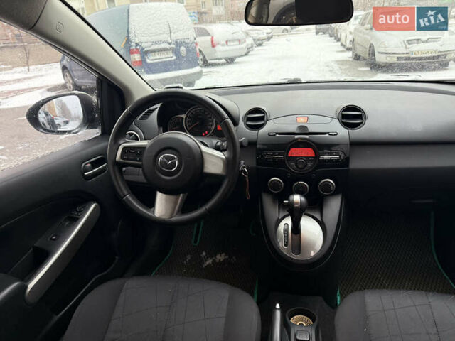 Зелений Мазда 2, об'ємом двигуна 1.5 л та пробігом 151 тис. км за 7100 $, фото 11 на Automoto.ua
