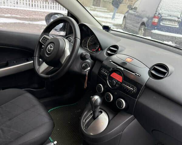 Зелений Мазда 2, об'ємом двигуна 1.5 л та пробігом 151 тис. км за 7100 $, фото 14 на Automoto.ua