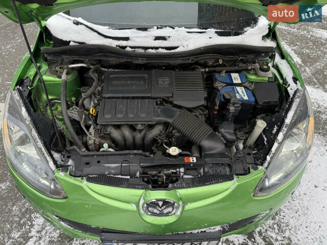 Зелений Мазда 2, об'ємом двигуна 1.5 л та пробігом 151 тис. км за 7100 $, фото 20 на Automoto.ua