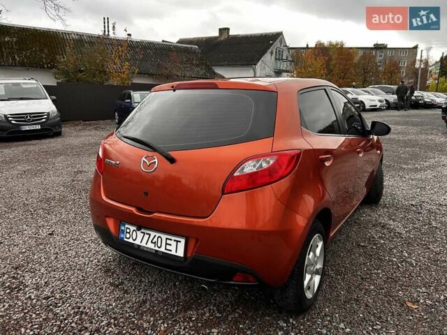 Оранжевый Мазда 2, объемом двигателя 1.5 л и пробегом 268 тыс. км за 6350 $, фото 5 на Automoto.ua