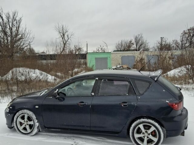 Черный Мазда 3 МПС, объемом двигателя 1.6 л и пробегом 285 тыс. км за 4500 $, фото 8 на Automoto.ua